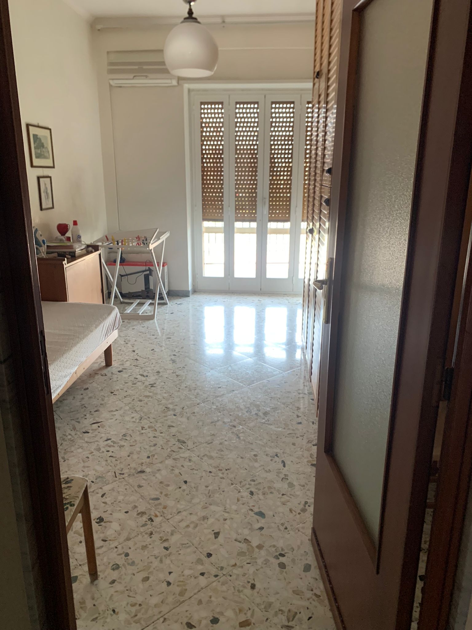 Stanza Singola Confortevole con Balcone